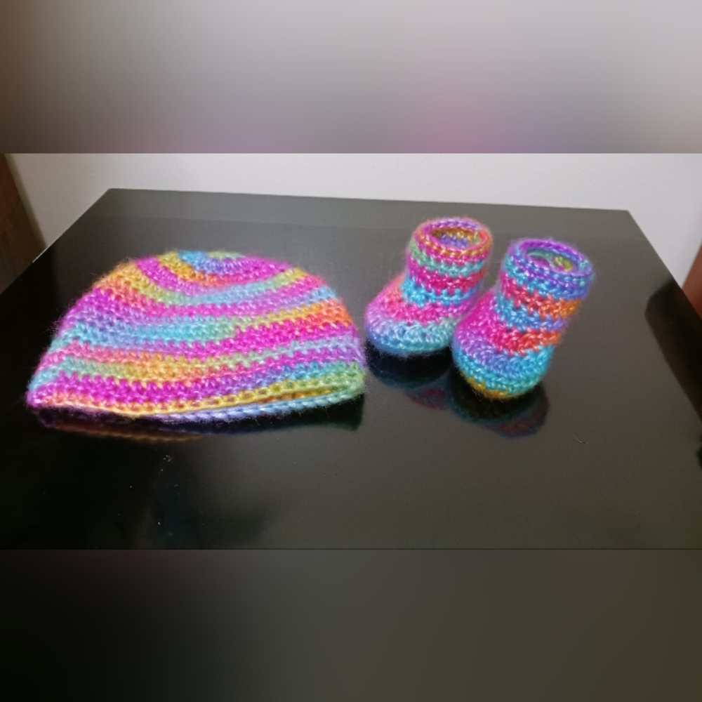 Handmade baby booties and hat
